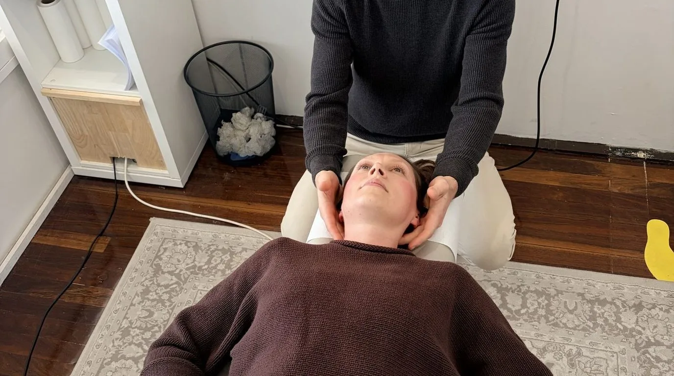 A chiropractor treating a patient